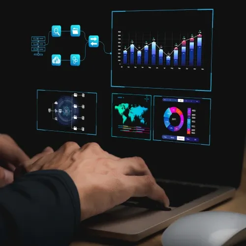 Person working on laptop displaying data analytics dashboard