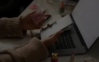 girl with tech and cosmetics